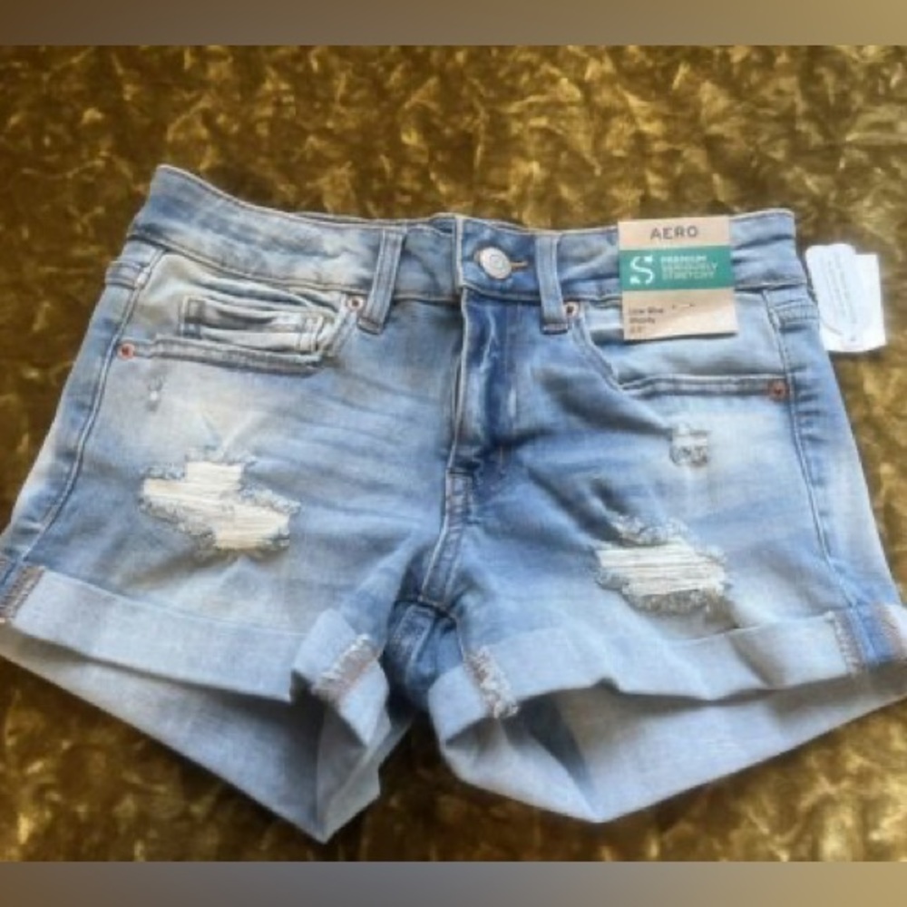 Aero Women’s premium seriously stretchy low-rise denim shorty shorts size 4